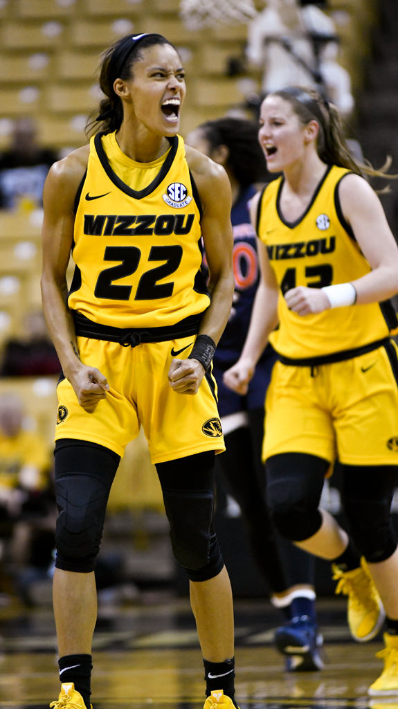 Missouri's Jordan Roundtree, left, and Hannah Schuchts celebrate a score
